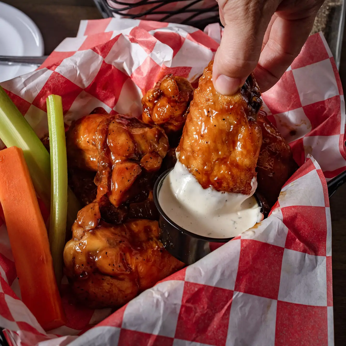 Wings slow baked and flash fried, with celery, carrots and ranch
