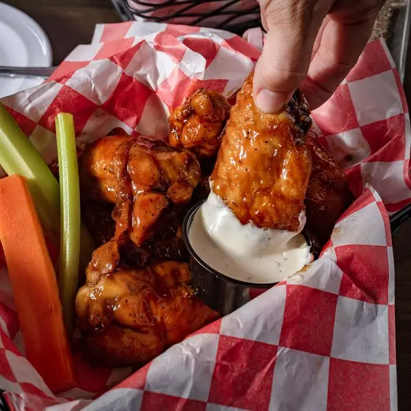 A basket of wings, slow baked and flash fried