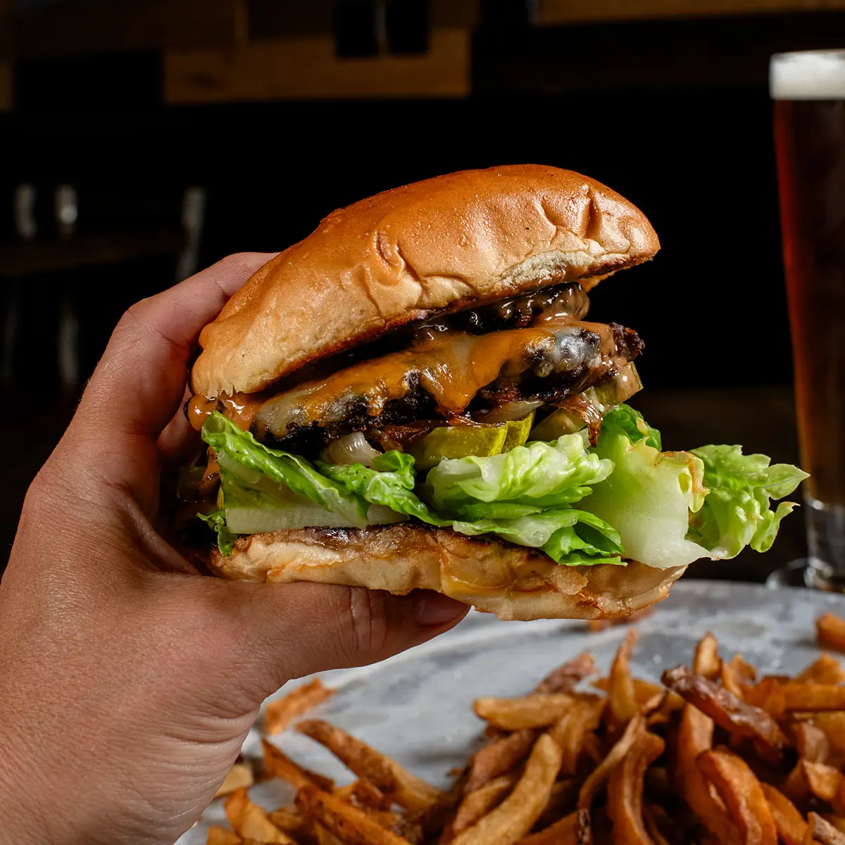 The Ale House burger with fries