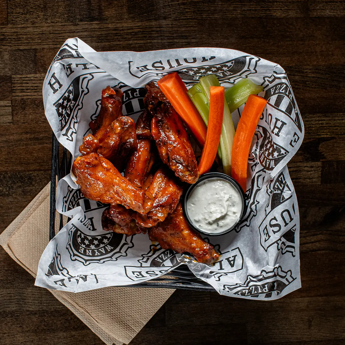Wings slow baked for three hours then flash fried in beef tallow